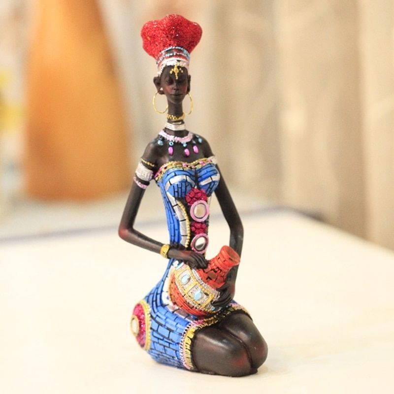 AfroÉlégance: Statue de Femme Africaine Assise