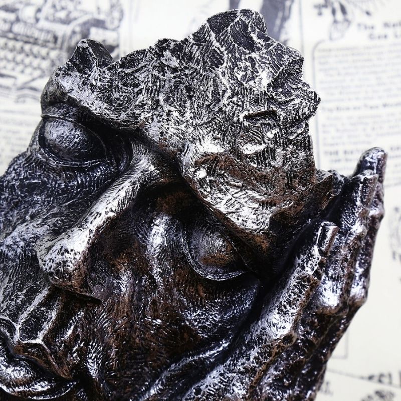 Statue Dorée: Visage d'Homme