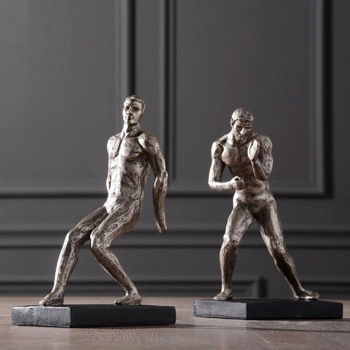 Statue Homme-Serre-Livre