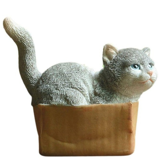 statue-de-chat-dans-carton