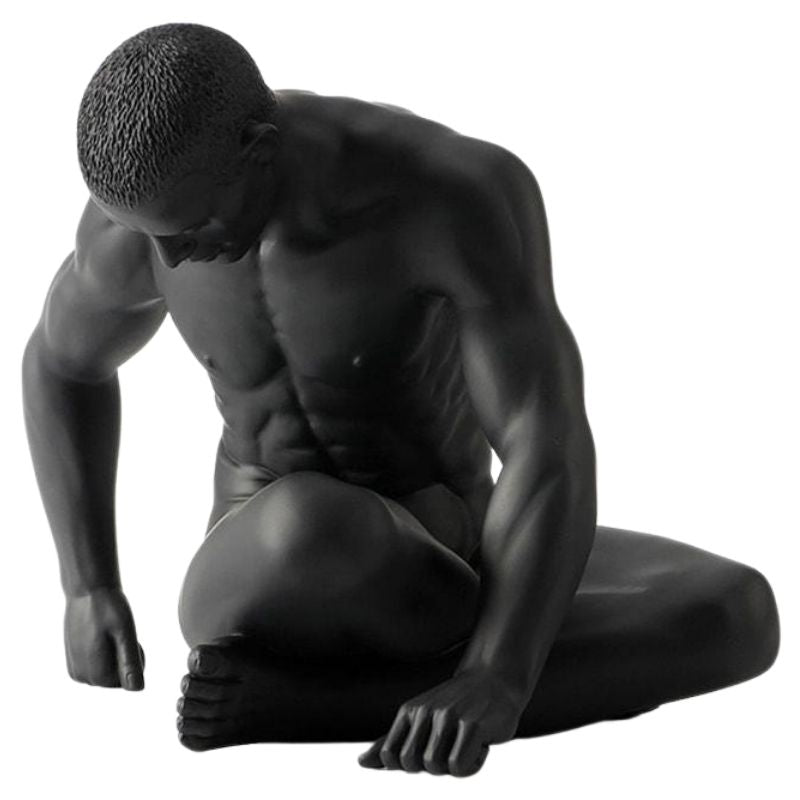 statue-homme-paresseux-assis