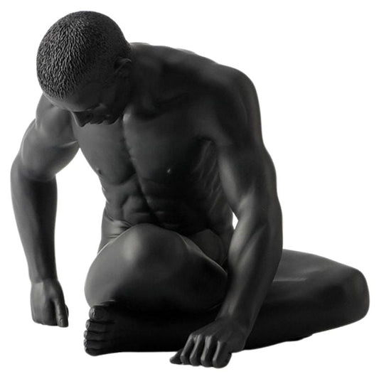 statue-homme-paresseux-assis
