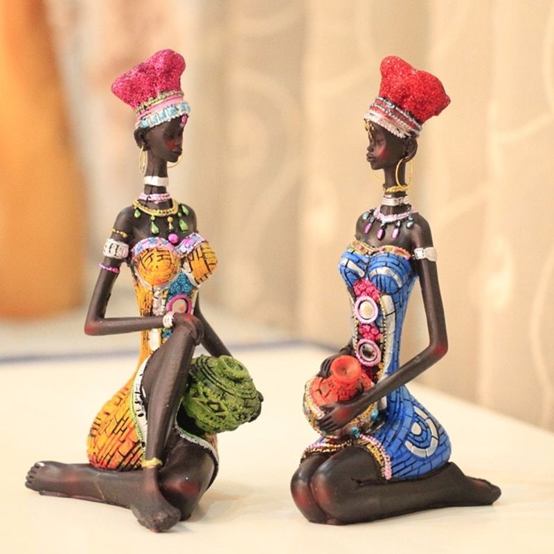 AfroÉlégance: Statue de Femme Africaine Assise