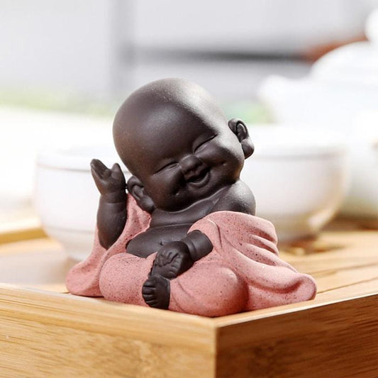 statue-bouddha-petit-bouddhiste